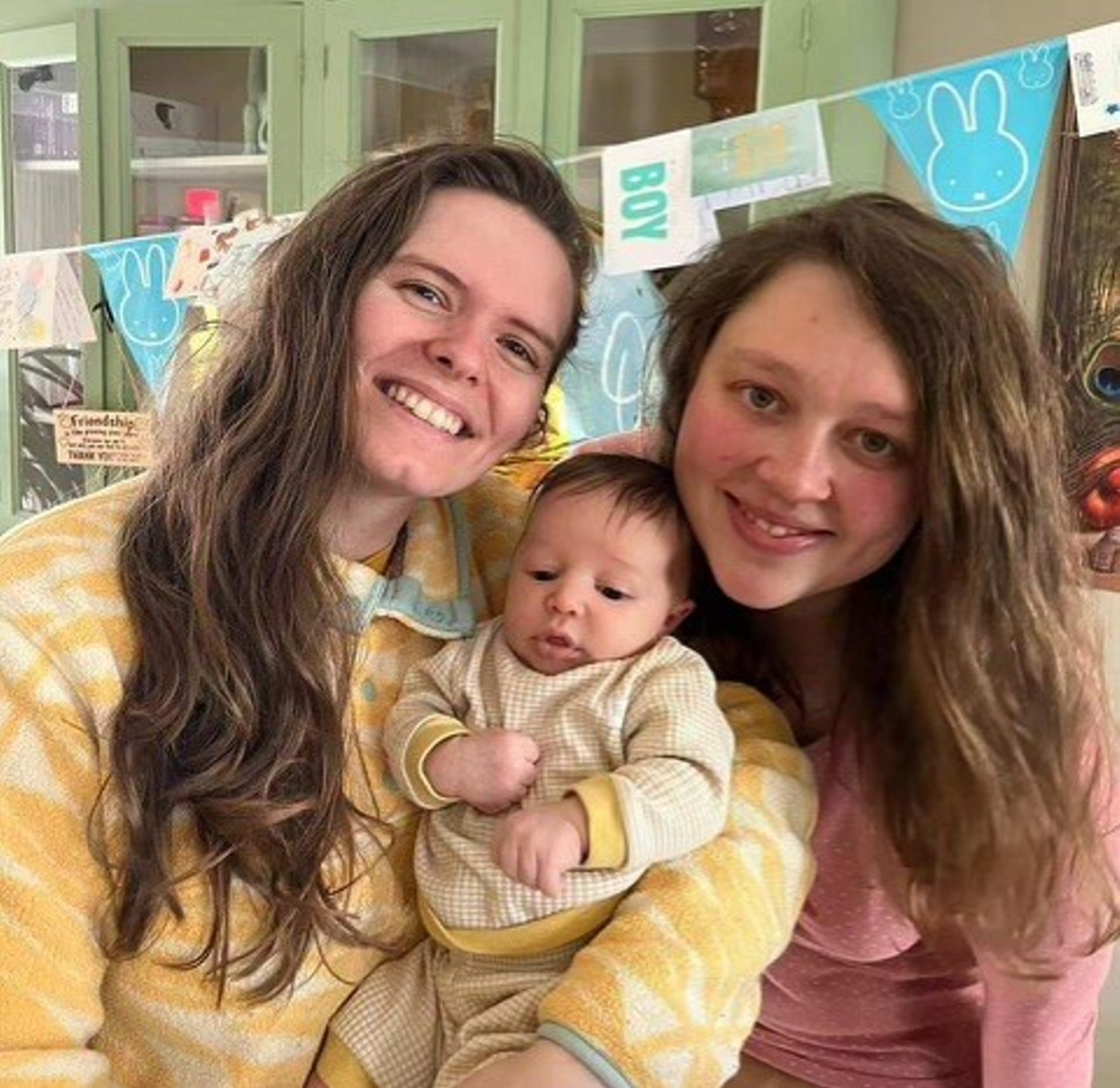 Adam's sister Jade, 29, and her wife Eefje, 30, with their baby