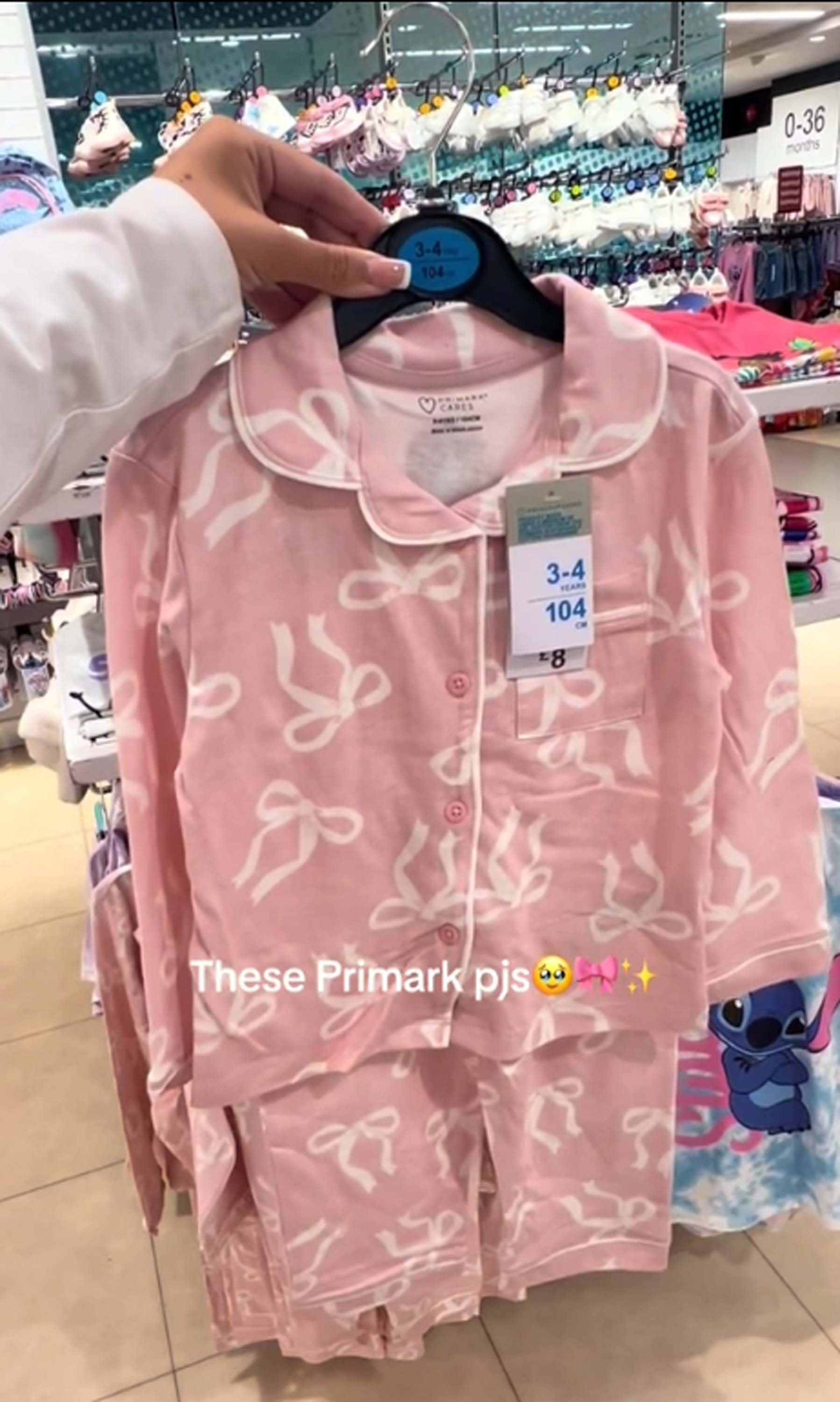 The £8 pyjamas are covered in cute pink bows