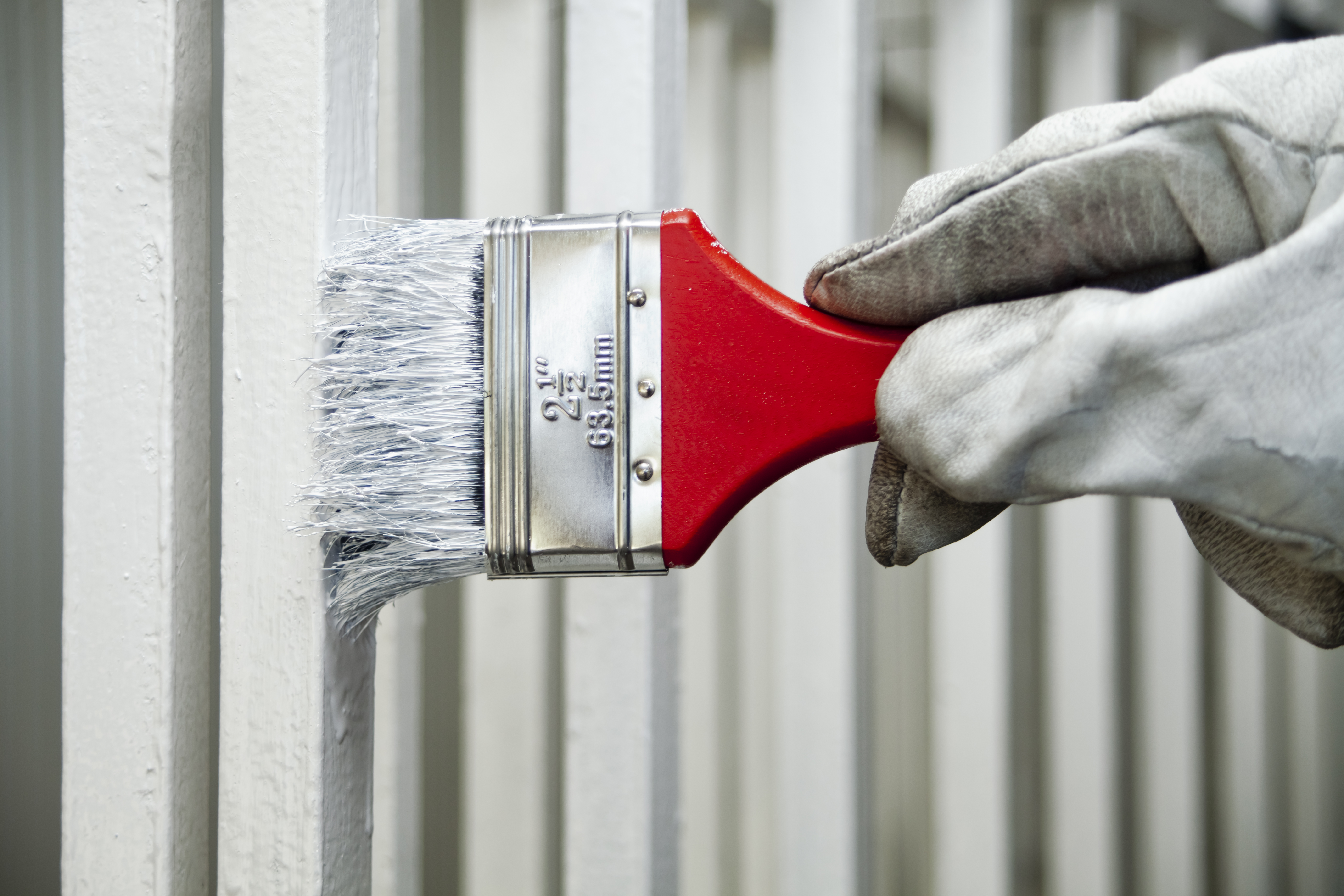 A handy mom didn't want to spend a fortune replacing her stair railing, so instead she gave the existing set a lick of paint