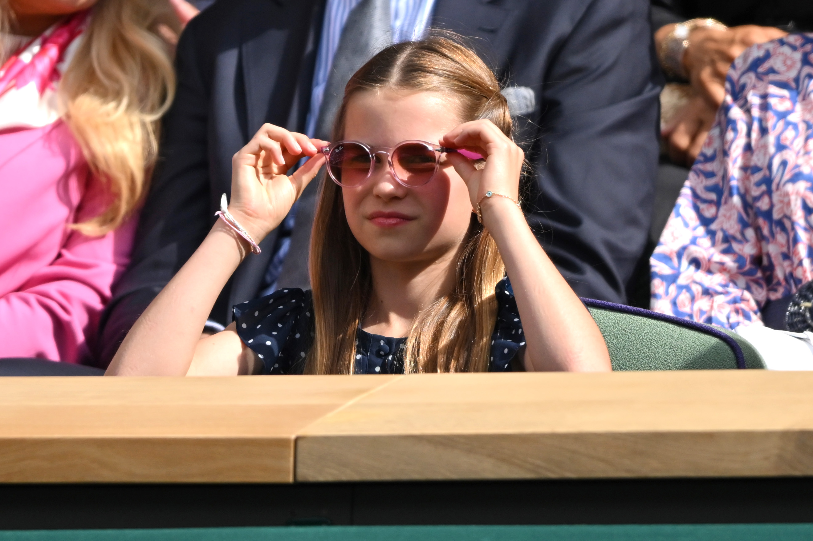 The princess paired her outfit with cute pink sunglasses