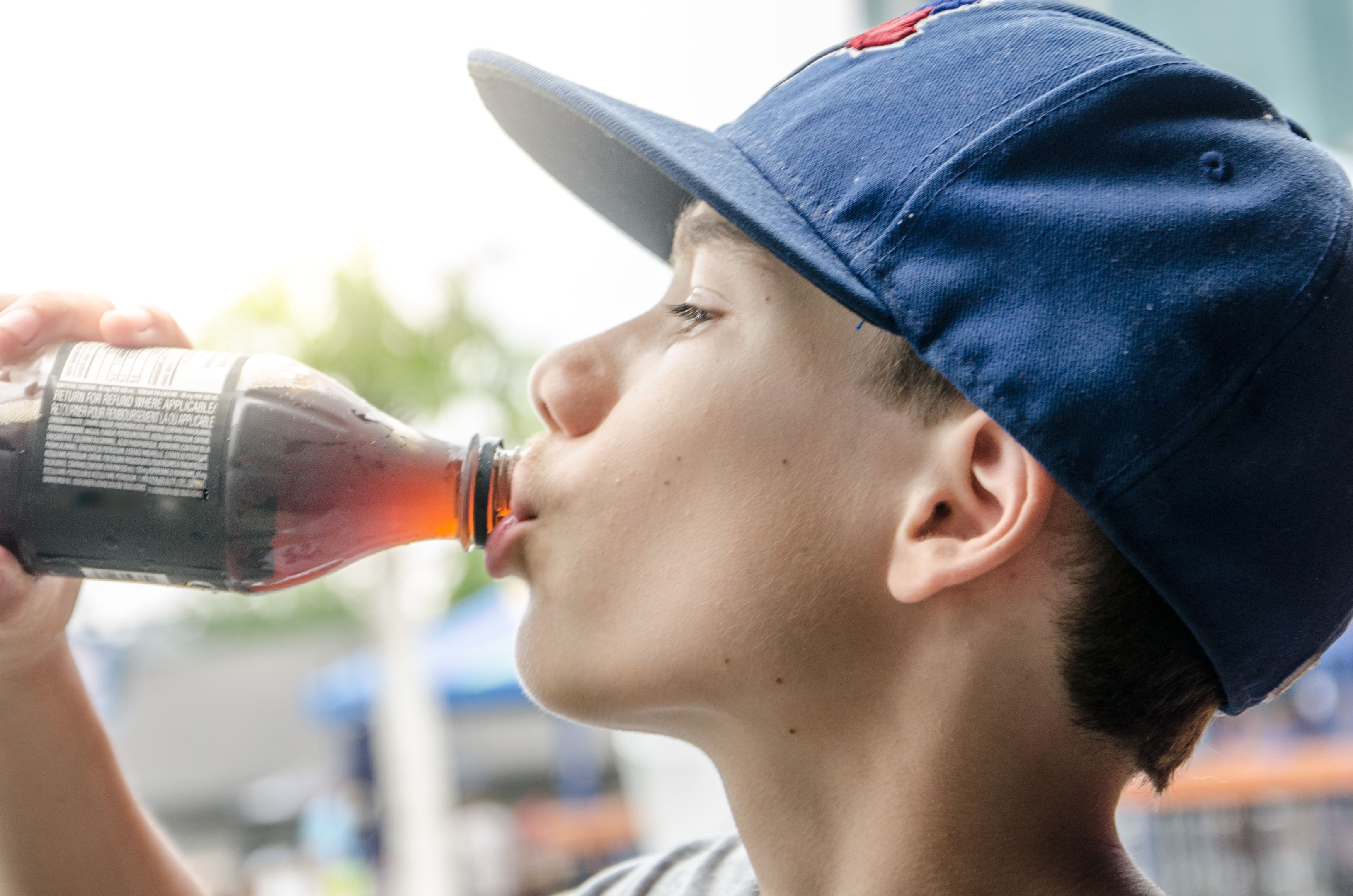 The mother was not happy when her son finally got the drink