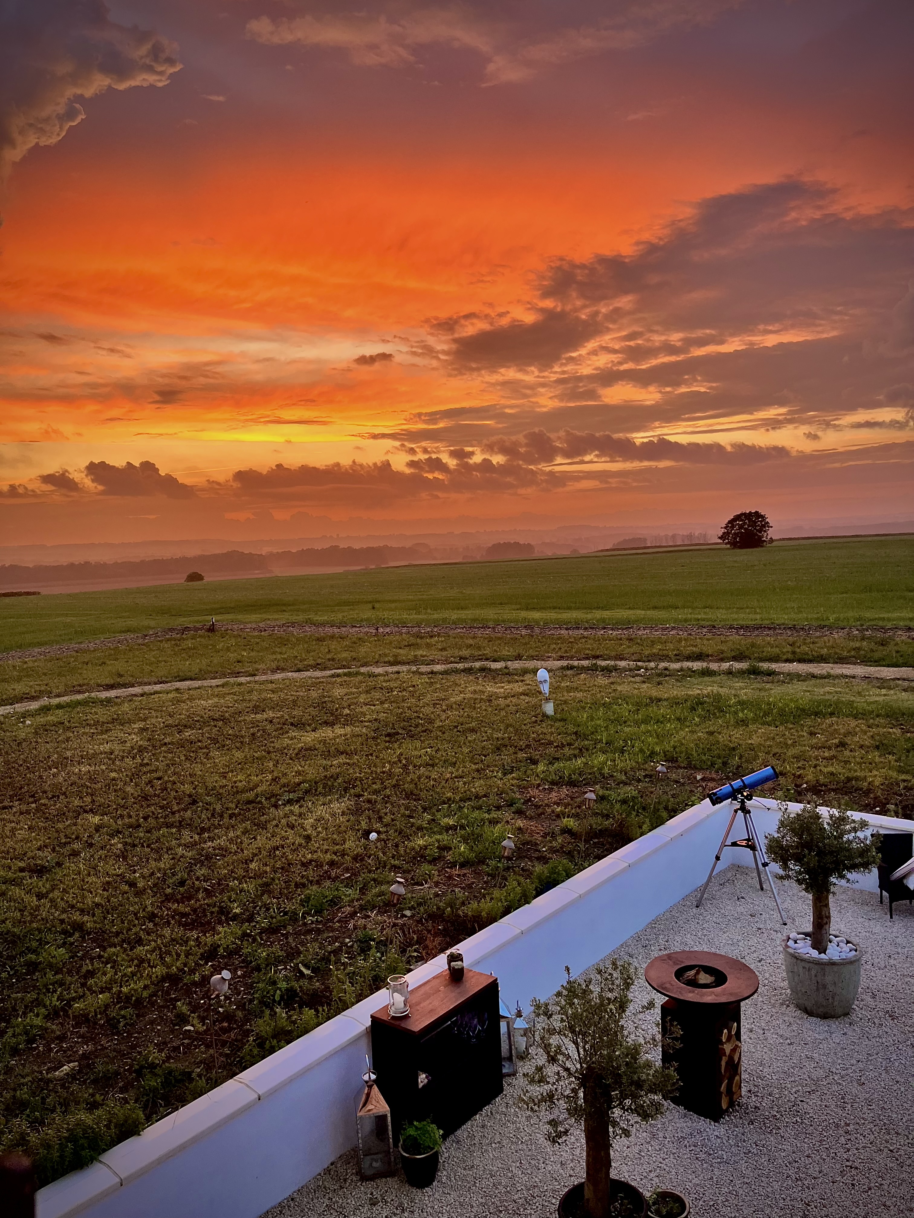 Sean and Lolly can experience beautiful sunsets over their land