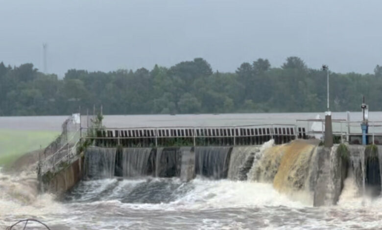 River overflows dam in Wisconsin amid heavy rains, endangering small town