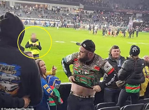 Watch the moment angry football fans call security guards ‘clowns’ as they accuse a man of brawling in wild scenes at an NRL match