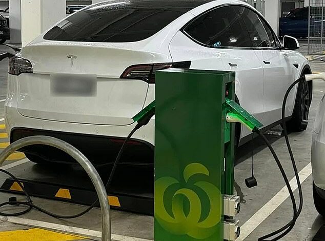 Tesla driver sparks outrage after shocking act in front seat while parked at Woolworths charging station: ‘Completely selfish’