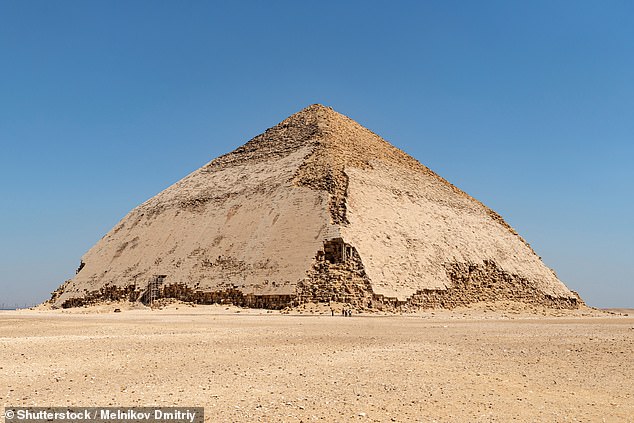 ‘It’s claustrophobic and if the power goes out, you’re in the dark!’ Travellers film mesmerising journey through VERY narrow tunnels into the heart of an Egyptian pyramid. Some visitors are too scared to go inside.