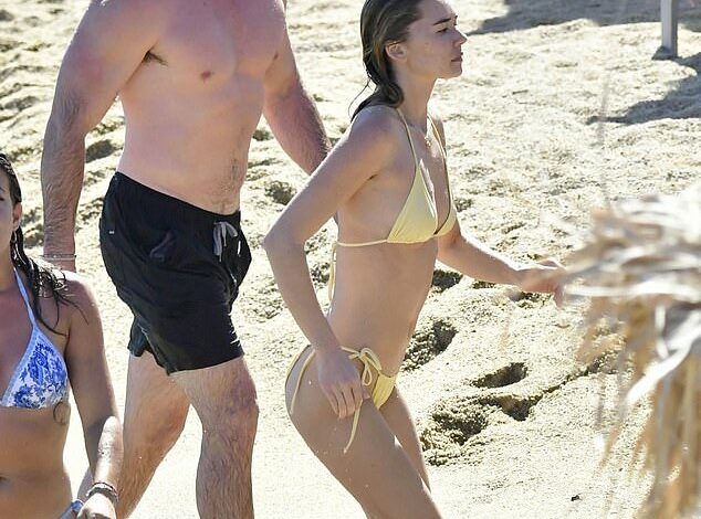 Liam Hemsworth and her gorgeous model girlfriend Gabriella Brooks show off their impressive beach bodies during a European vacation in Mykonos