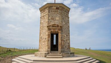 Work to save coastal watchtower completed after two years: 188-year-old building moved inland stone by stone for the SECOND time in its history to prevent it from collapsing into the sea