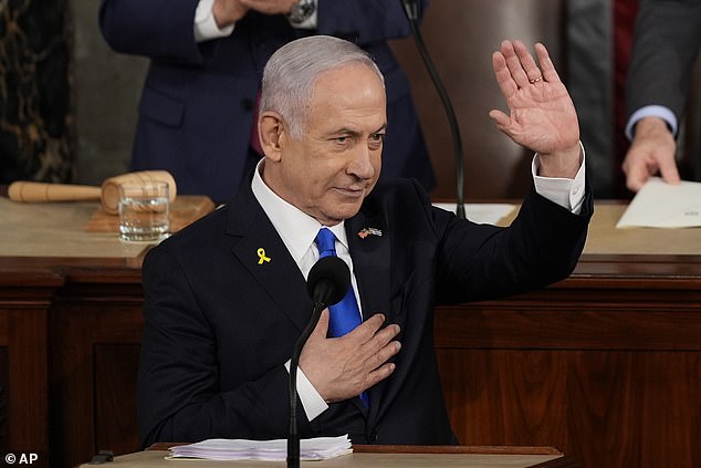 Netanyahu claims pro-Palestinian protesters are ‘idiots’ who stand with ‘rapists’: SIX arrested as Israeli PM addresses deeply divided Congress