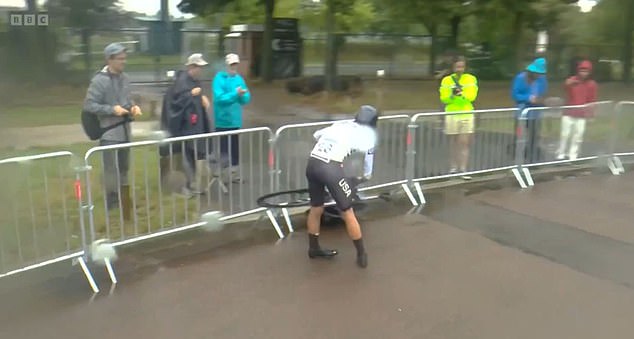 American cyclist Taylor Knibb falls off her bike FOUR times and her mechanic falls too as wet weather causes CHAOS during Paris Olympic time trials