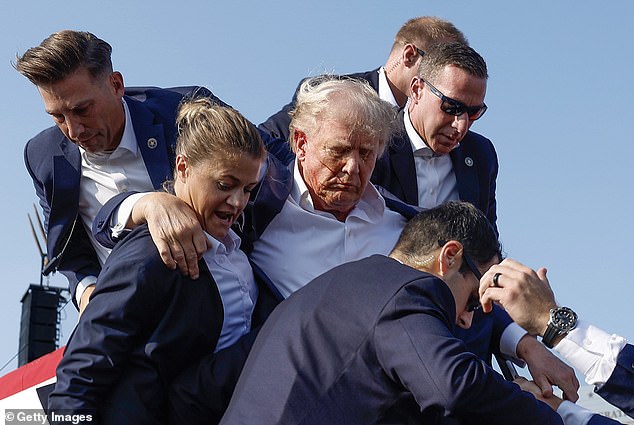 Trump defends ‘brave’ Secret Service agent who ‘protected’ him during assassination attempt after woman was attacked by online trolls: ‘She wanted to take a bullet’