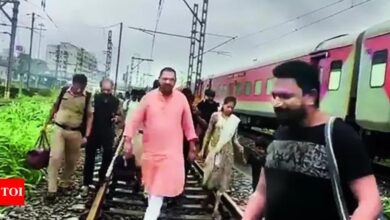 Netas get a taste of aam aadmi misery, step off trains and trudge along tracks | India News – Times of India