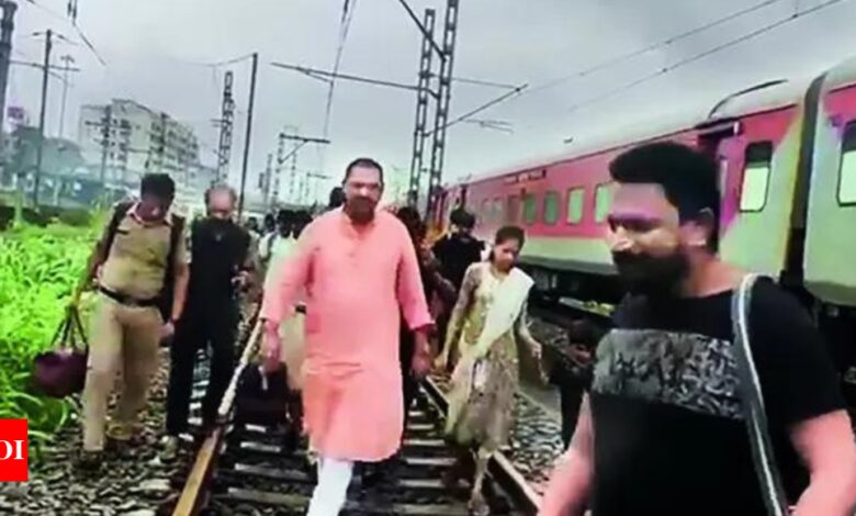 Netas get a taste of aam aadmi misery, step off trains and trudge along tracks | India News – Times of India