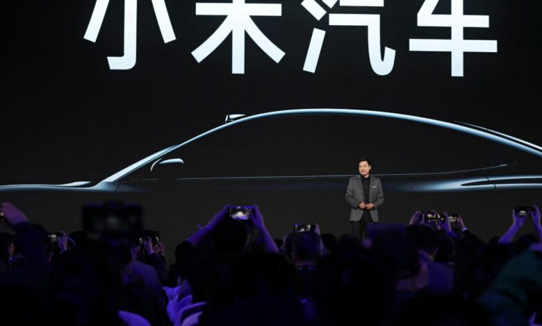 Smartphone maker Xiaomi unveils first electric car, SU7, in China