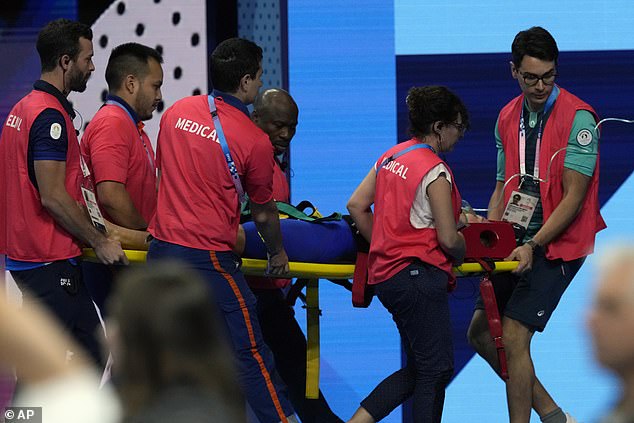 21-year-old Slovakian swimmer Tamara Potocká collapses and is carried off on a stretcher in front of shocked spectators and her British rival after completing the Olympic 200m medley