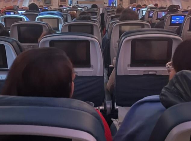 Delta plane passenger furious after being forced to ‘rawdog’ a NINE-HOUR flight with a broken TV screen