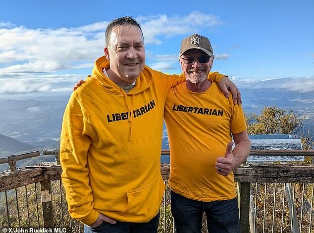 Wollumbin-Mount Warning: Act of defiance as state MP and protester ignore ban on climbing Indigenous landmark in secret early morning hike – a day after one of them was fined for breaking the rule