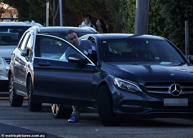 Troubled ex-TV star Andrew O’Keefe is spotted behind the wheel of his luxury Mercedes days after his drink-driving arrest as legal troubles mount