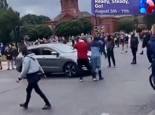 Moment rioters demand drivers reveal if they are ‘white and English’ while stopping traffic during violent protests in Middlesbrough as police warn the public to ‘stay away’ from the town