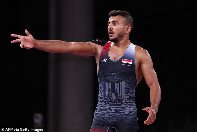 Egyptian Olympic wrestler arrested on suspicion of sexual assault for ‘groping a woman from behind outside a cafe’ in the early morning hours in Paris