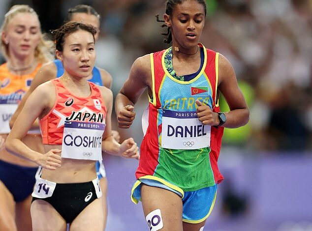 Bizarre moment women’s 10,000m final leader Rahel Daniel ‘walks away’ mid-race in Paris – before being stopped from leaving stadium by Olympic officials