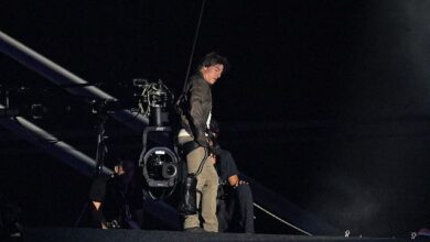 Hollywood legend Tom Cruise jumps from the ROOF the stadium in death-defying stunt during extravagant handover ceremony that transformed the Hollywood sign into Olympic rings before performances from Billie Eilish Red Hot Chili Peppers and Snoop Dogg