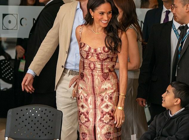 Meghan Markle looks elegant in ,150 dress with stylish slit as she watches folk dancers with Prince Harry on Colombia Tour