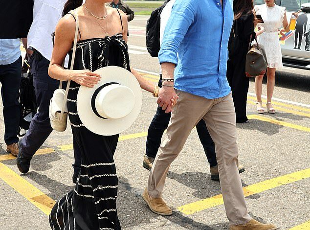 Meghan Markle opted for modest black and white attire on the third day of her Colombian tour (but her beloved jewels were worth over £40,000 in total!)