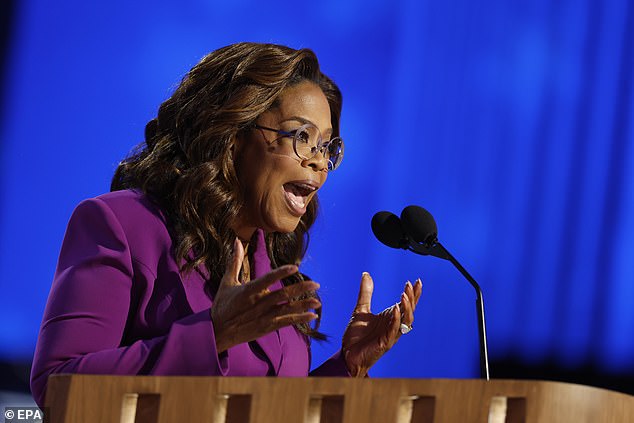 Moment the camera switches to a female audience member during a VERY unfortunate part of Oprah’s DNC speech