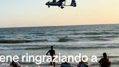 Dramatic moment as low-flying gyrocopter crashes into sea near shocked beach sunbathers and swimmers – officials say it was ‘only a coincidence that it didn’t end in tragedy’