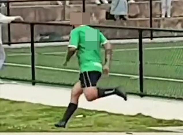 Wild moment when a local soccer referee is chased off the field by an angry player – who then kicks in a door