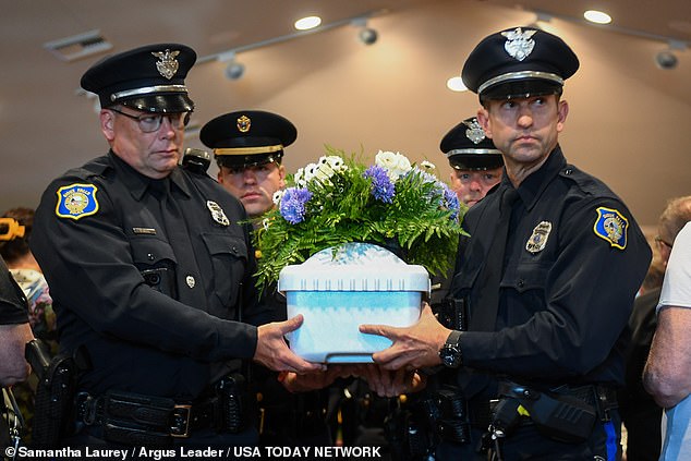 Baby boy without family is buried in heartbreaking ceremony, his tiny coffin carried into church by officers