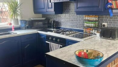 We transformed our boring brown kitchen using cheap spray paint and tiles from B&M