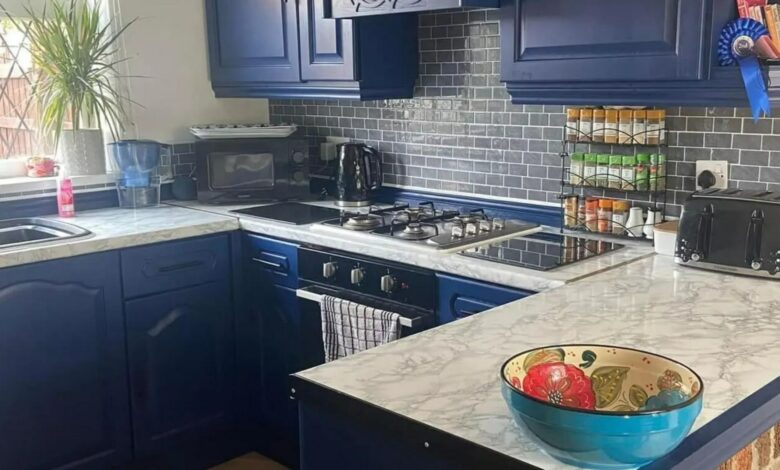 We transformed our boring brown kitchen using cheap spray paint and tiles from B&M