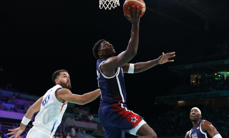 US men’s basketball team defeats Puerto Rico to secure first place