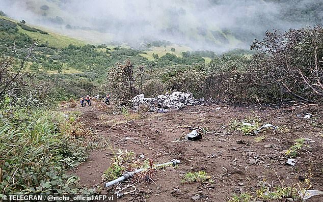 Tourist helicopter crashes near volcano, all 22 people on board die