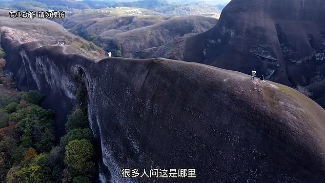 Pictured: China’s nerve-wracking ‘knife-edge’ mountain that daredevils traverse despite its steep slopes – and without safety fences