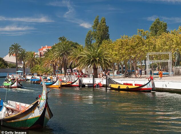 Welcome to the ‘Venice of Portugal’ – where temperatures soar to 29 degrees, bustling canals line the streets and pints cost just £1.80