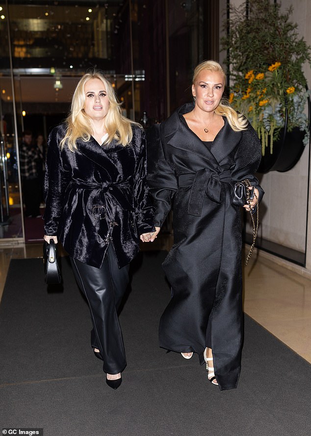 Rebel Wilson and new wife Ramona Agruma are seen holding hands for the first time since tying the knot during their honeymoon in Paris