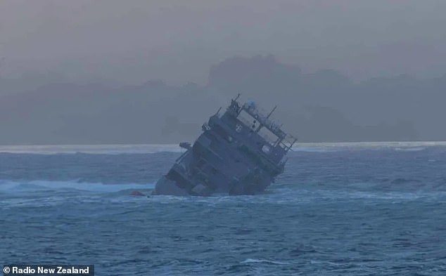 Moment when Royal New Zealand Navy ship catches fire and sinks after running aground on a coral reef while crew members are shipwrecked in Samoa