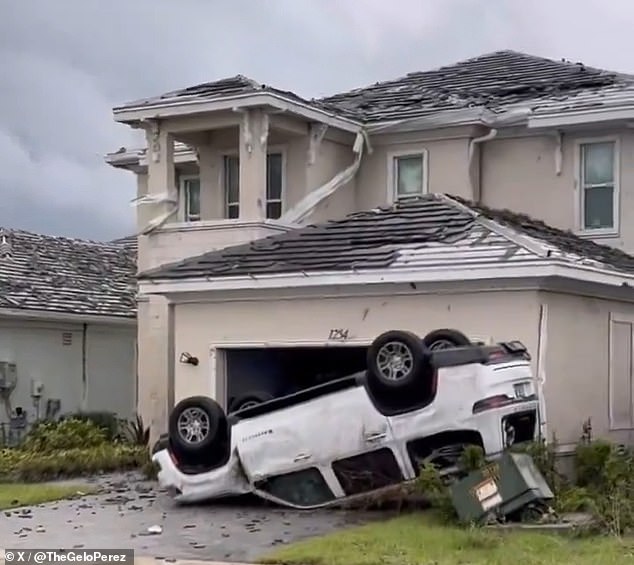 Tornado cuts path of destruction through Florida neighborhood, shredding roofs and toppling cars