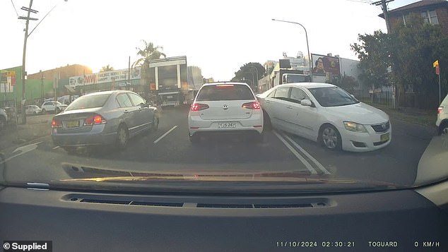 A major police chase is underway on Parramatta Road in Sydney’s west as an out-of-control car crashes into parked vehicles