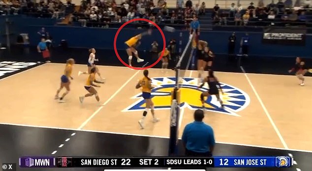 Moment when controversial trans athlete hits volleyball in rival’s face, causing her to fall to the ground