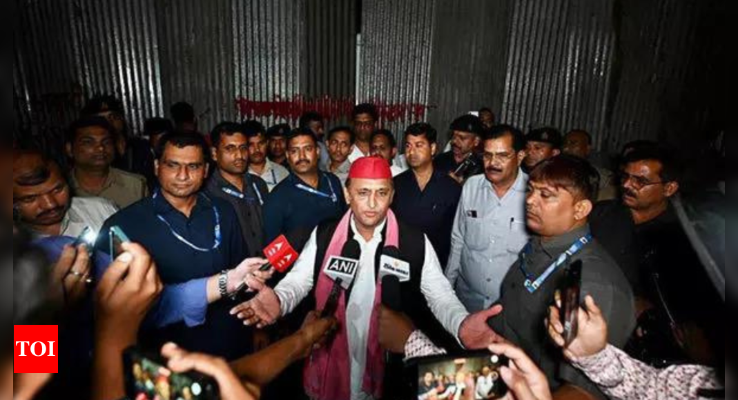 Akhilesh Yadav visits JPNIC at night and slams government for blocking access with tin sheets | India News – Times of India