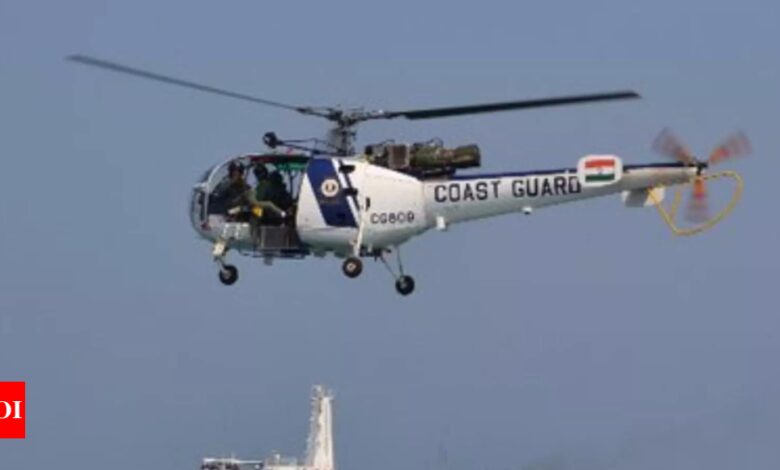 Body of coast guard pilot found month after helicopter crash | India News – Times of India