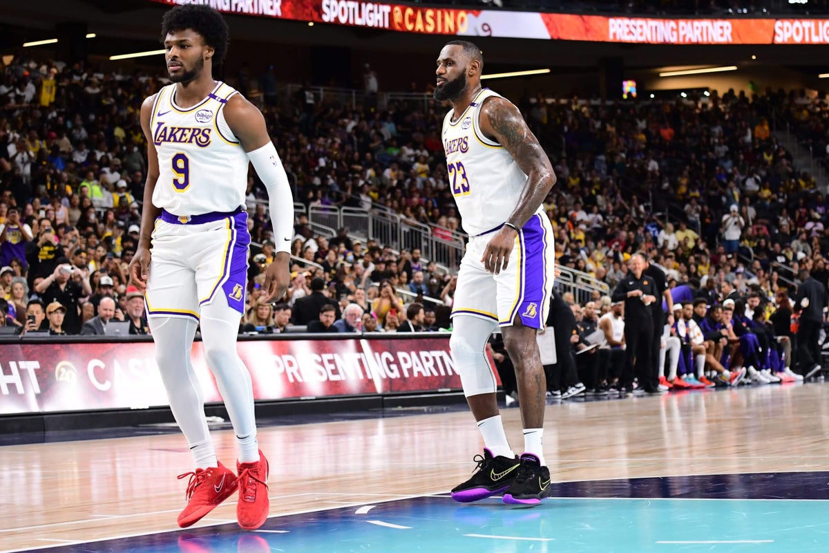 Lakers’ LeBron James and Bronny James become the first father-son duo to share the court in NBA history