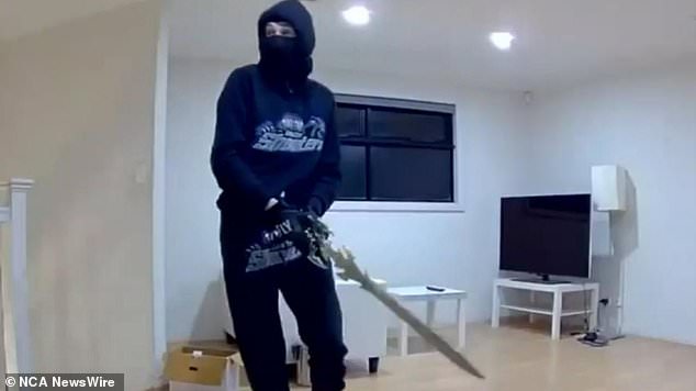 Chilling moment three masked thugs with a metal pipe, a baseball bat and a SWORD ransack a house in an Adelaide suburb, caught on camera