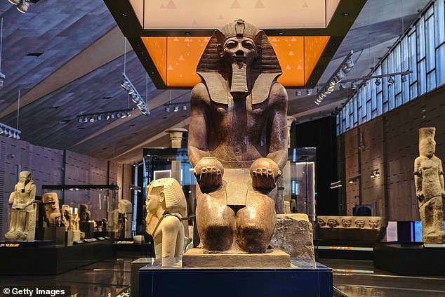 Pictured: the breathtaking displays at the Grand Egyptian Museum, which has FINALLY opened its doors to visitors