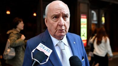 Alan Jones is arrested at his luxury apartment over allegations that he indecently assaulted, groped or inappropriately touched several young men