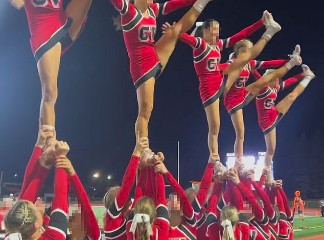 ‘Humiliating’ act that white cheerleaders forced a black teammate to do while taking photos and videos